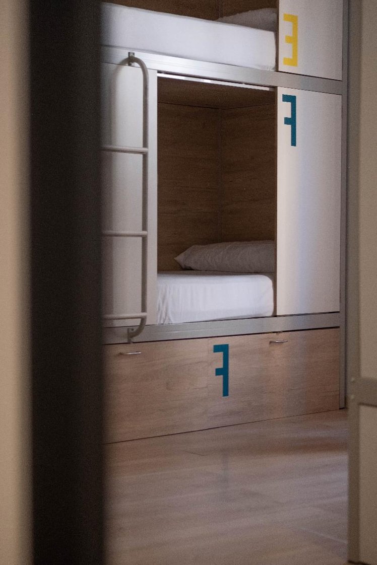 Bed in dormitory FEMALE ROOM CAPACITY 8 Room